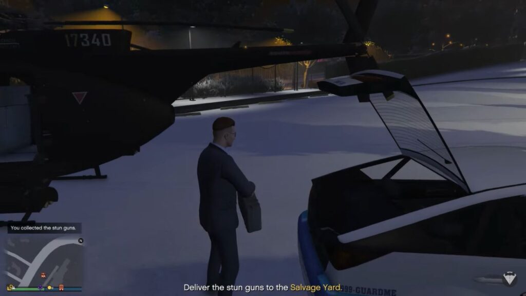 The player stealing Stun Guns from a car's trunk.
