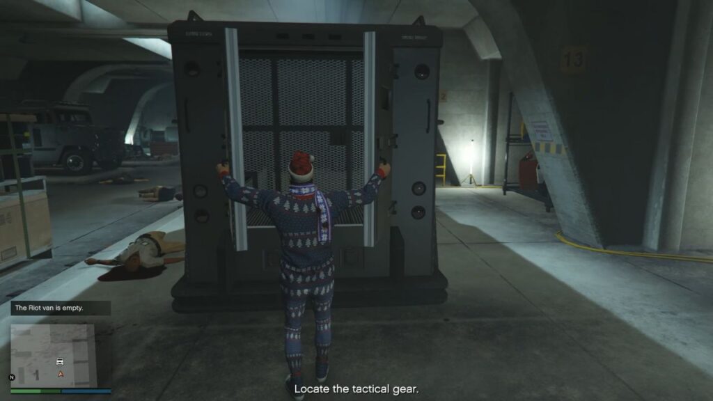 The player searching a Police Riot Van inside an IAA lockup with dead IAA agents nearby.