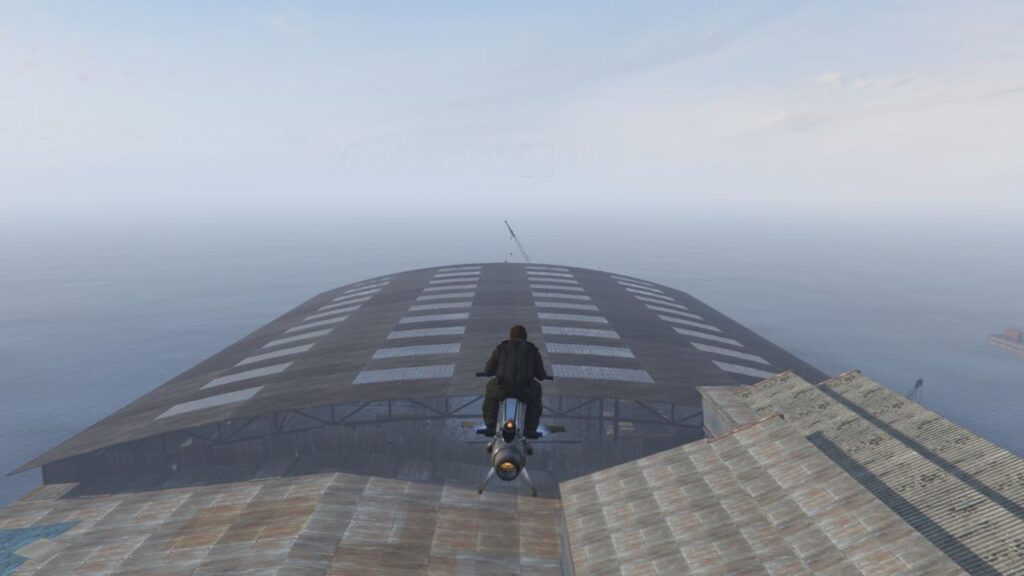 The player using the Oppressor Mk II flying at the top of the Merryweather HQ in Elysian Island.